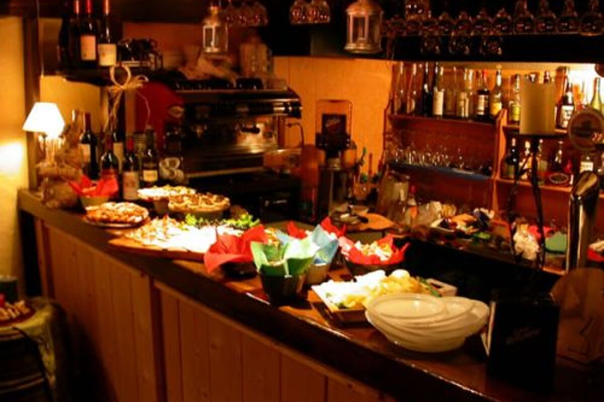 A bar filled with lots of food and drinks