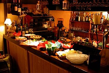 A bar filled with lots of food and drinks