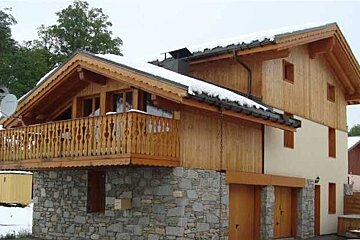 chalet wooden panles and stone wall