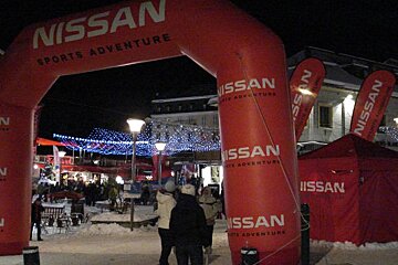 A red nissan sports adventure inflatable archway
