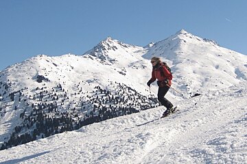 skier with Mont Vallon as background