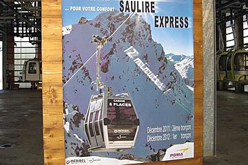 An image of a poster advertising the new Saulire Express ski lift in Meribel