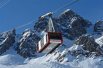 The word courchevel is on the side of a ski lift