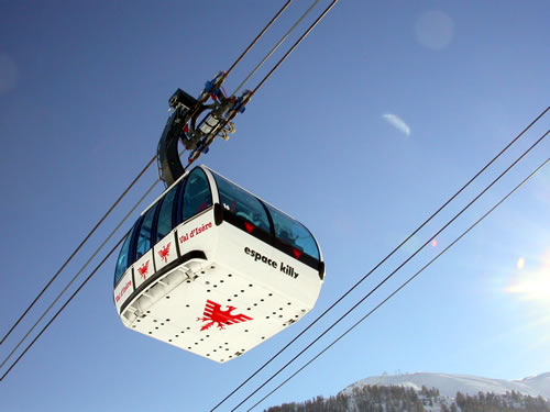 A ski lift that says espace killy on it