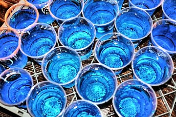 An image of a tray of Blue Lagoon cocktails in Saloon bar