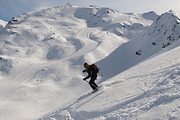 girl skier in powder