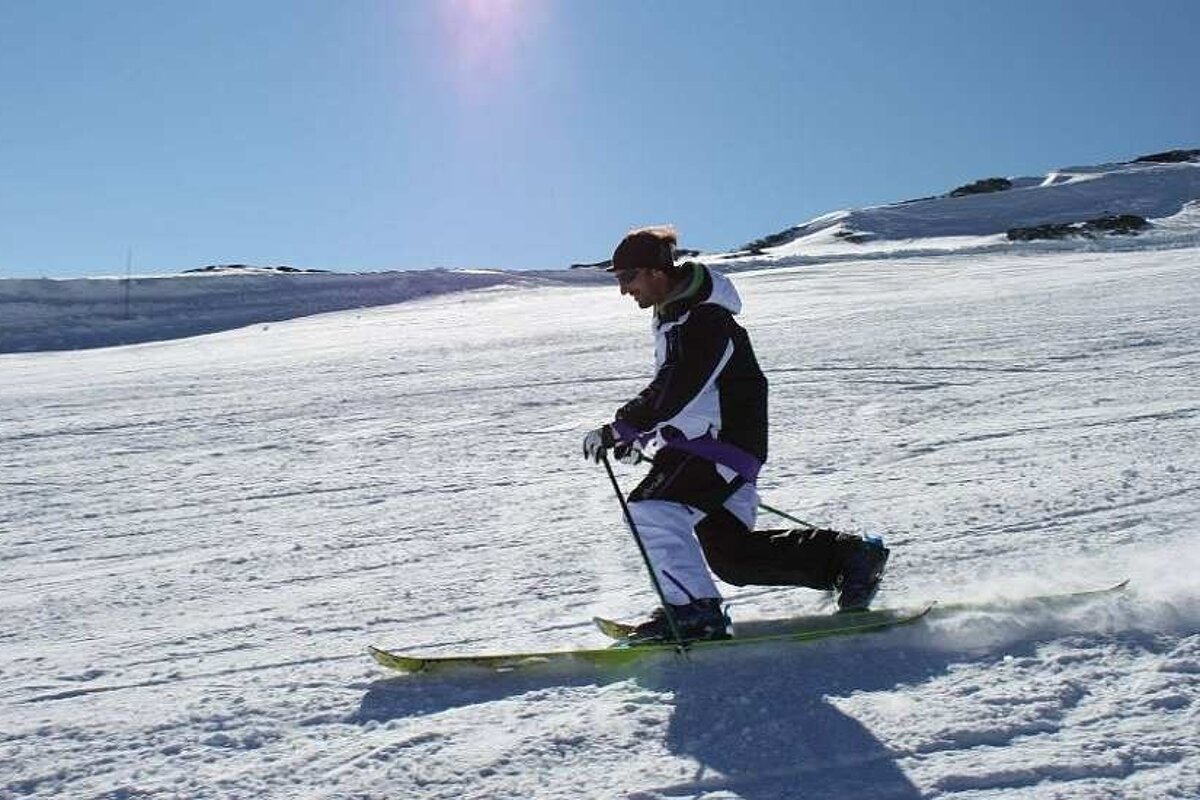 an image of a man on telemark skis 