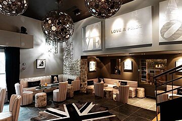 an image of a large bar area with a union flag rug printed on cow hide