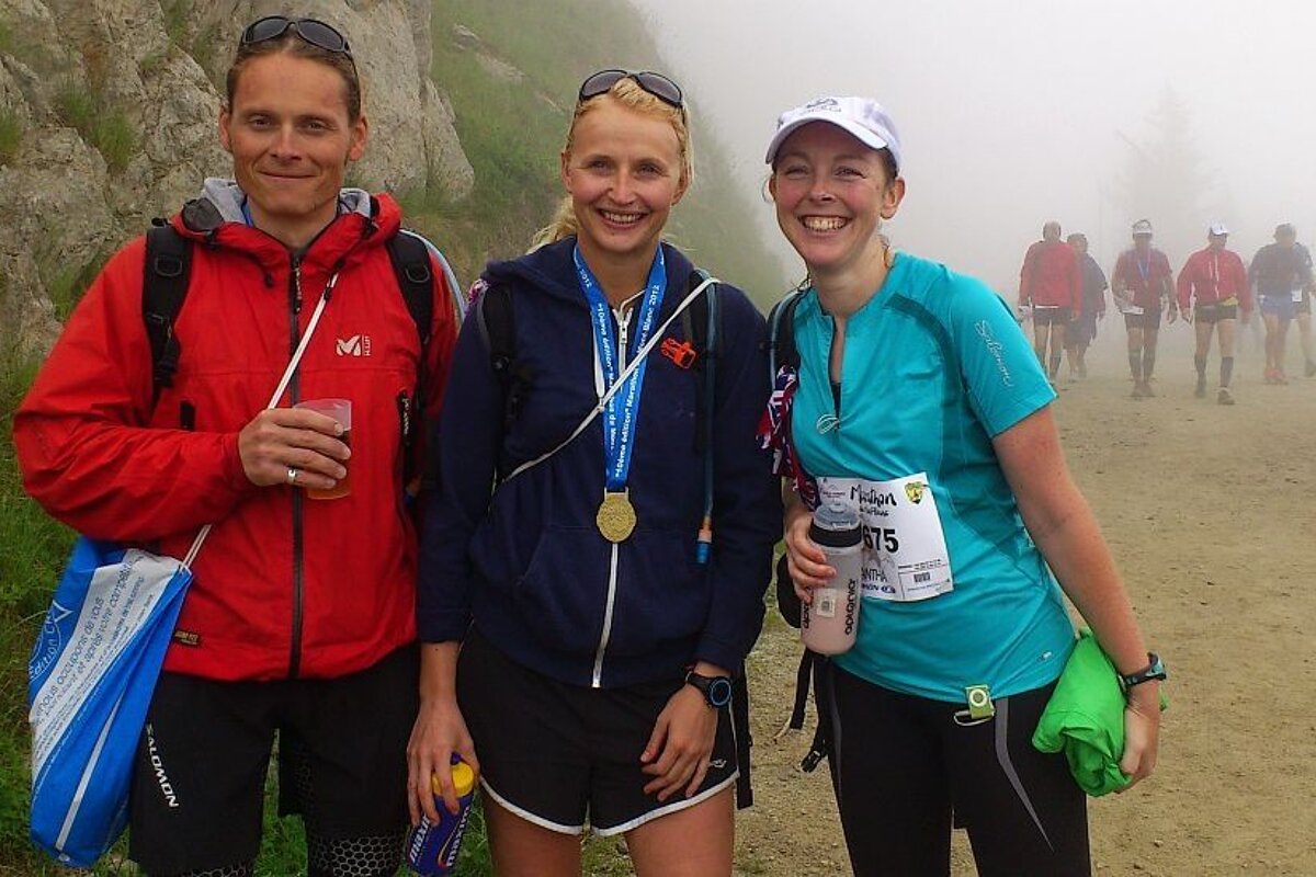 An image of runners with finishers medals for the marathon in Chamonix Mont Blanc