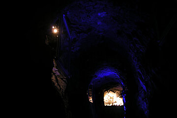 A dark cave with a light at the end