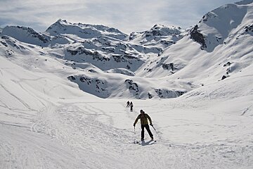 skier crossing frozen lake