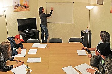 adults in the classroom learning languages