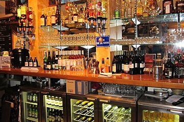 Back bar with bottles and glasses