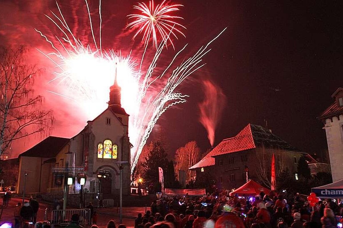 An image of fireworks over the church in Chamonix as part of the ESF winter family entertainment