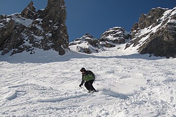 skier in grand couloir