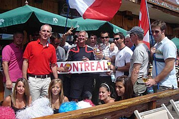 A group of people holding a sign that says montreal