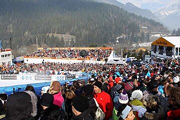 An image of crowds watching the Kandahar Men's Alpine Skiing World Cup in Les Houches Chamonix Mont Blanc