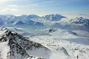 View of mountains and Alpe d'Hues from Pic Blanc