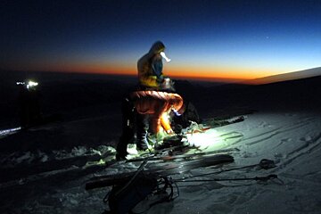 Roping up on Mont Maudit as dawn approaches