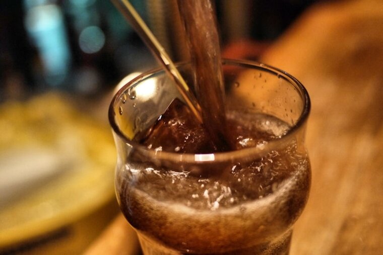 An image of a drink being poured at The Frog and Roastbeef