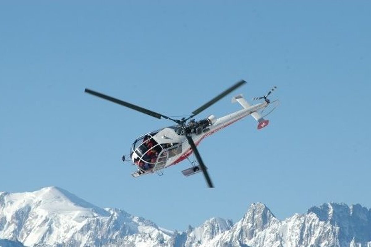 helicopter mountain backdrop