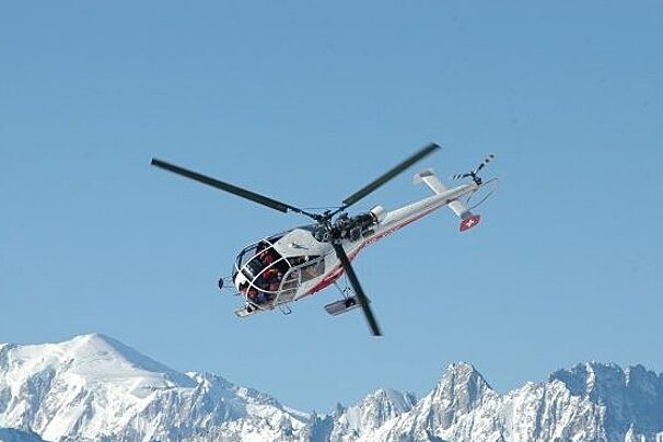 helicopter mountain backdrop