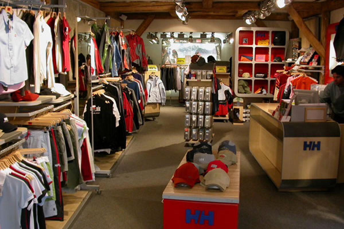 A clothing store with a red box that says hh on it