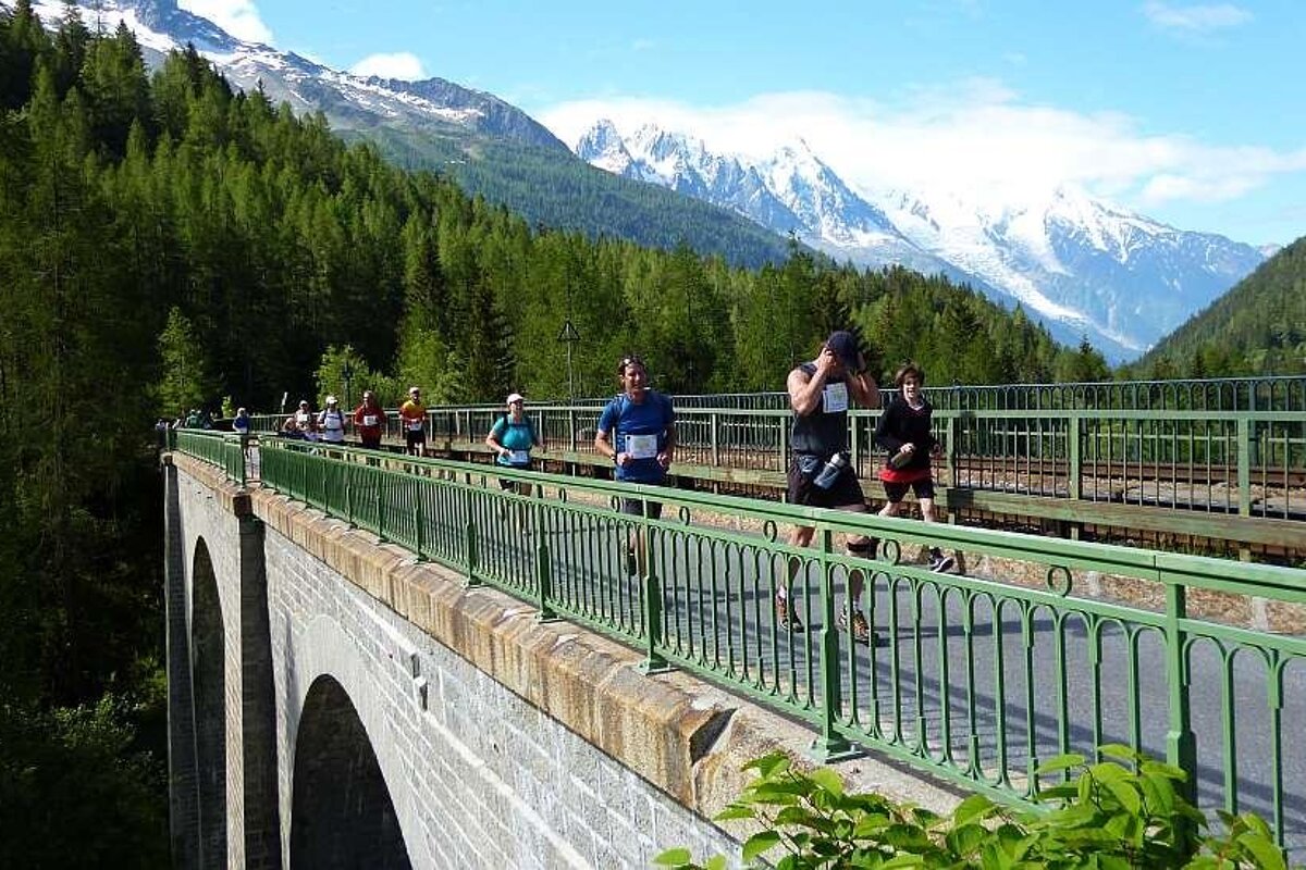 An image of runners crossing the bridge at Montroc, Marathon du Mont Blanc