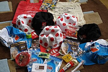 A bag that says haribo on it is surrounded by other items