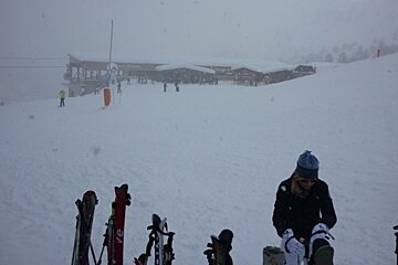 Tougnete mid station with skis in foreground