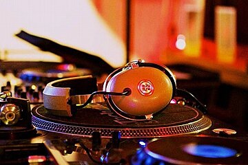An image of DJ decks and headphones