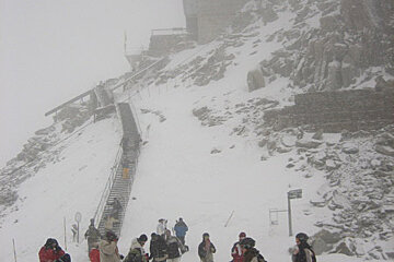A group of people skiing on a snowy mountain