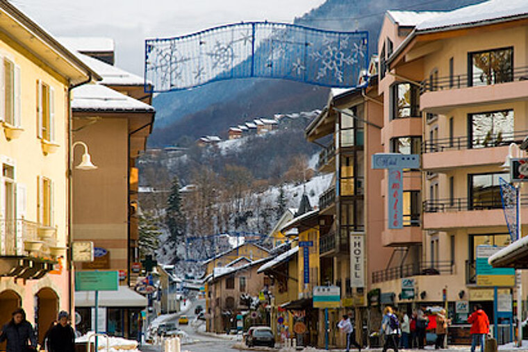 The word hotel is on the side of a building