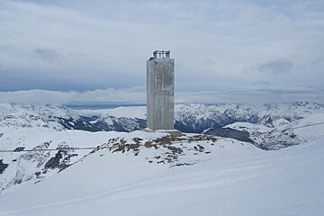 Concrete tower at top of mountain
