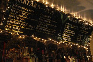 A chalkboard with cocktails written on it