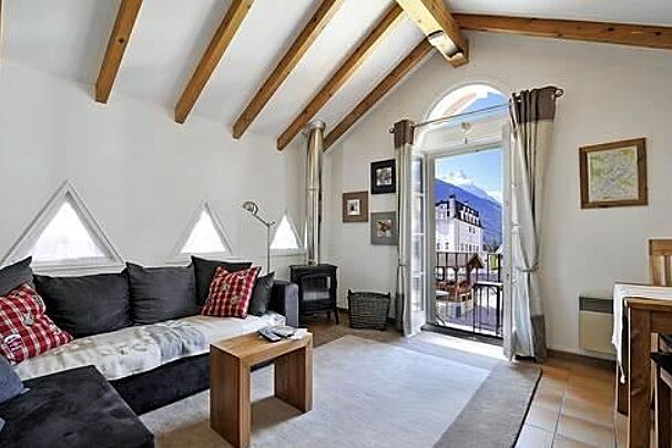 an image of the interior of an apartment living room