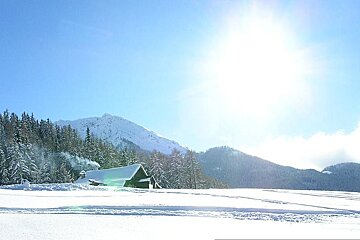 An image of a chalet restaurant in the snow in the ski resort of Montalbert in the French Alps