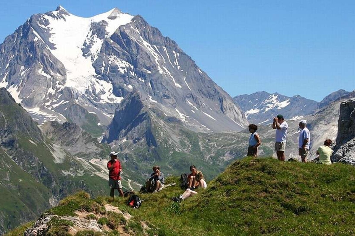 An image of a group of hikers in the Alps, summer activity with Meribel Bureau des Guides