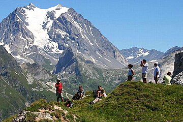 An image of a group of hikers in the Alps, summer activity with Meribel Bureau des Guides