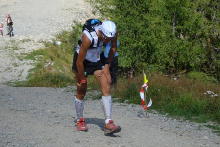 A runner with the number 1 on his shirt