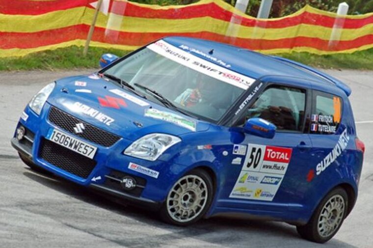 A blue car with the number 50 on it