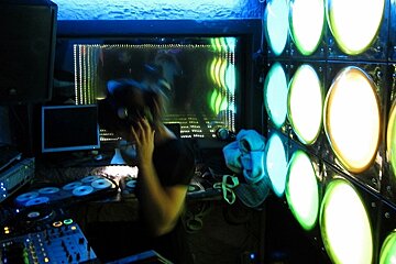 DJ Izzy behind the decks at Casbah