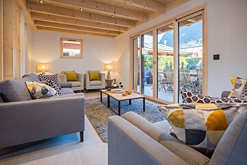 A living room with two couches and a coffee table