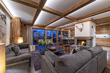 A living room filled with furniture and a fireplace