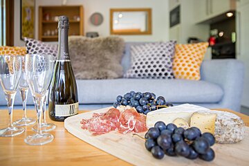 A bottle of napa valley wine sits on a table