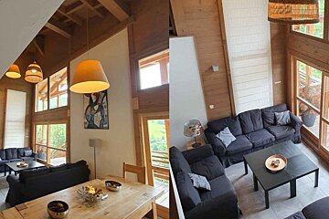 A living room with a dining table and a couch