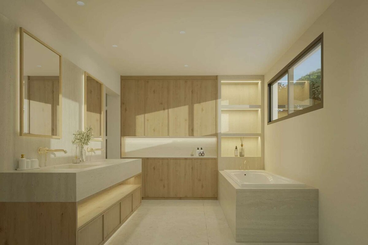 A bathroom with two sinks and a bathtub