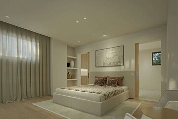 Bright, contemporary bedroom featuring a large bed, neutral tones, sheer curtains, abstract art, and built-in shelving.