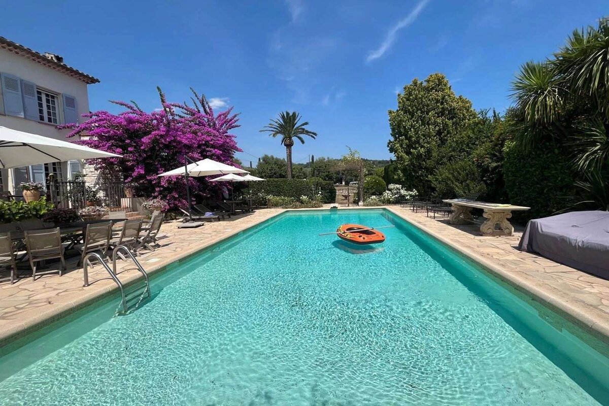 A large swimming pool with a boat in it