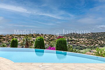A swimming pool with the words made in provence on the bottom